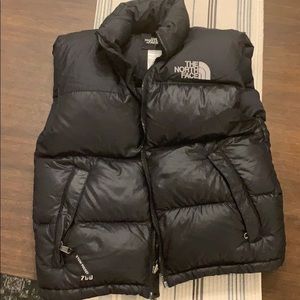 Black North Face puffy vest